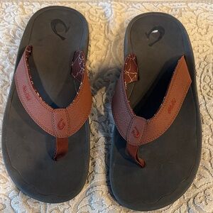 OluKai Brown and Black Sandals